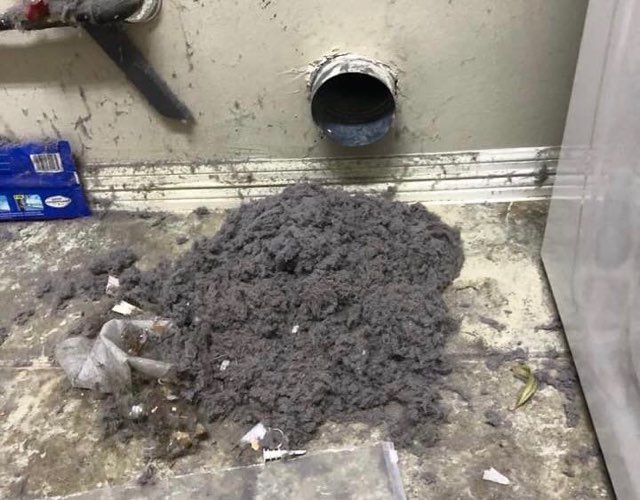 lint in front of a duct exit at a peoria customers home
